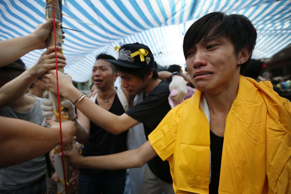 Pro-Umbrella or not, we should condemn human rights violations in Hong
Kong